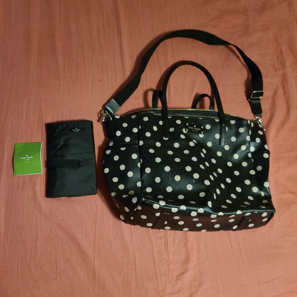 Pink Pockadot Women's Kate Spade Diaper bag.